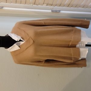 Beige sweater with mock shirt underneath.